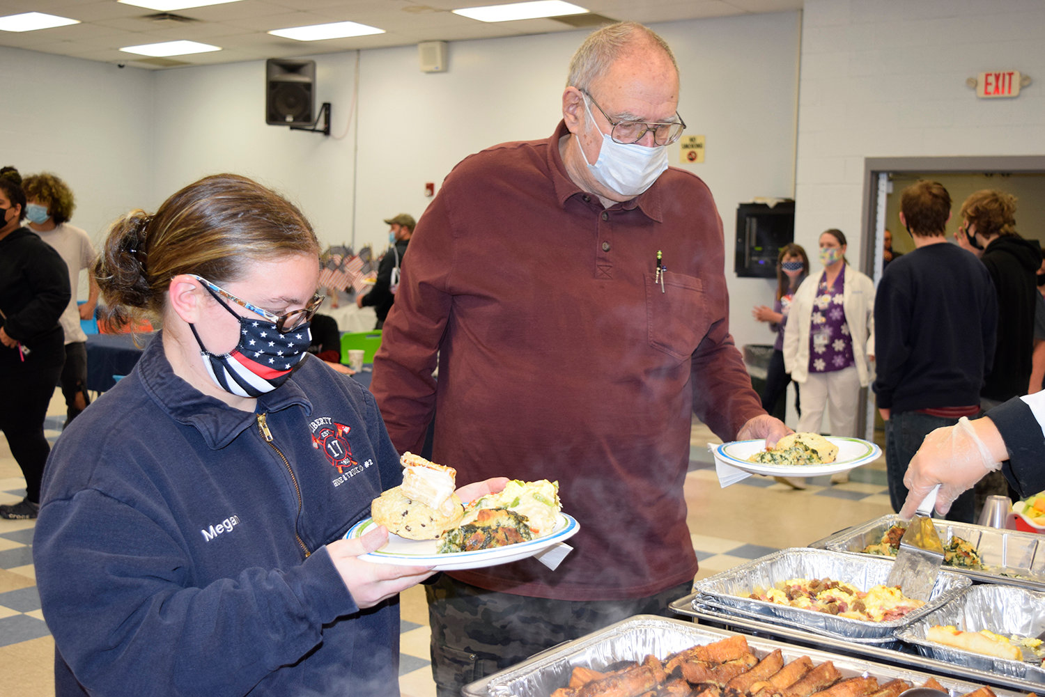 Eating together. Students and staff from Sullivan BOCES mingled with area veterans at a recent brunch. It was a chance for young people to learn from those who served.